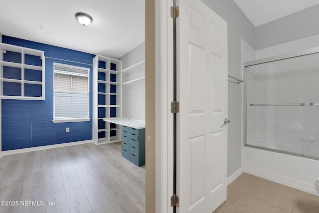 25122 Chipshot Ct, Sorrento, FL 32776 - full bath featuring bathing tub / shower combination and wood finished floors