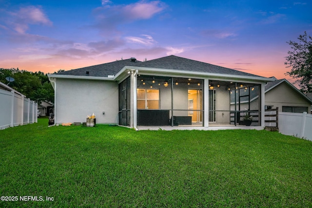 25122 Chipshot Ct, Sorrento, FL 32776 - rear view of property featuring a sunroom and stucco siding
