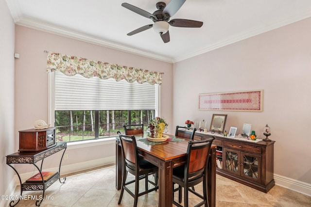 2645 Oakgrove Ave, Saint Augustine, FL 32092 - dining room featuring crown molding, light tile patterned floors, and a ceiling fan