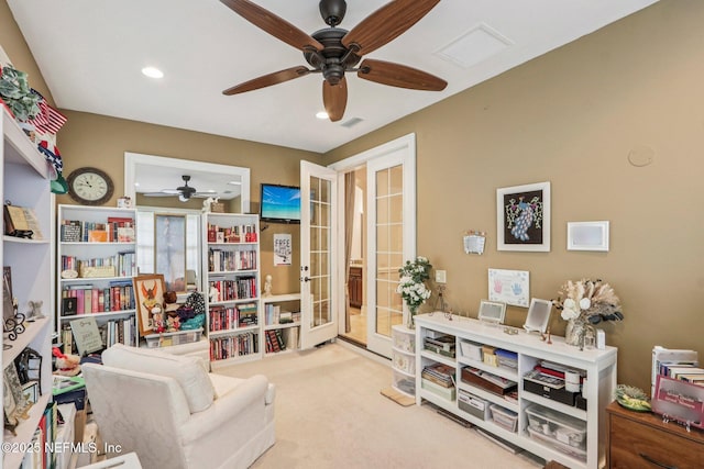 2645 Oakgrove Ave, Saint Augustine, FL 32092 - sitting room featuring a ceiling fan, recessed lighting, carpet flooring, and french doors