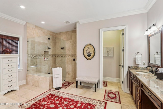 2645 Oakgrove Ave, Saint Augustine, FL 32092 - bathroom with a tile shower, tile patterned floors, vanity, ornamental molding, and recessed lighting