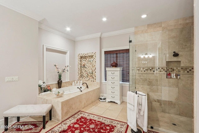 2645 Oakgrove Ave, Saint Augustine, FL 32092 - bathroom with a bath, ornamental molding, a shower stall, tile patterned flooring, and recessed lighting