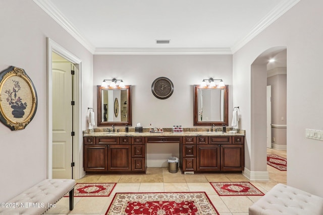 2645 Oakgrove Ave, Saint Augustine, FL 32092 - bathroom with ornamental molding, double vanity, and tile patterned floors