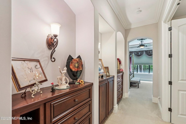 2645 Oakgrove Ave, Saint Augustine, FL 32092 - corridor with light colored carpet, arched walkways, and crown molding