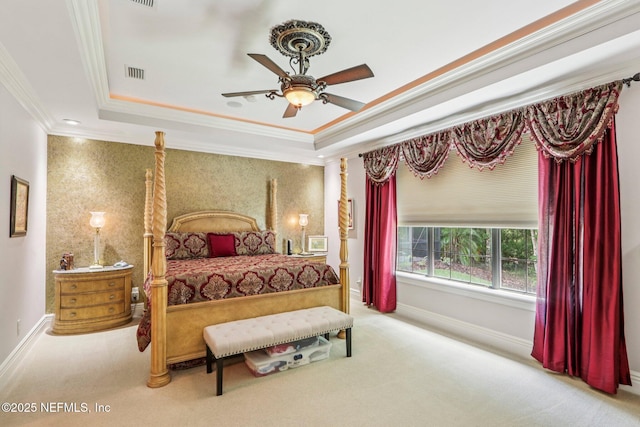2645 Oakgrove Ave, Saint Augustine, FL 32092 - carpeted bedroom featuring a raised ceiling, ornamental molding, and ceiling fan