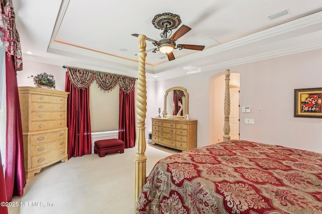 2645 Oakgrove Ave, Saint Augustine, FL 32092 - bedroom with light colored carpet, a tray ceiling, ornamental molding, and ceiling fan
