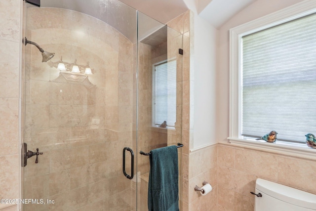 2645 Oakgrove Ave, Saint Augustine, FL 32092 - bathroom with a shower stall and tile walls