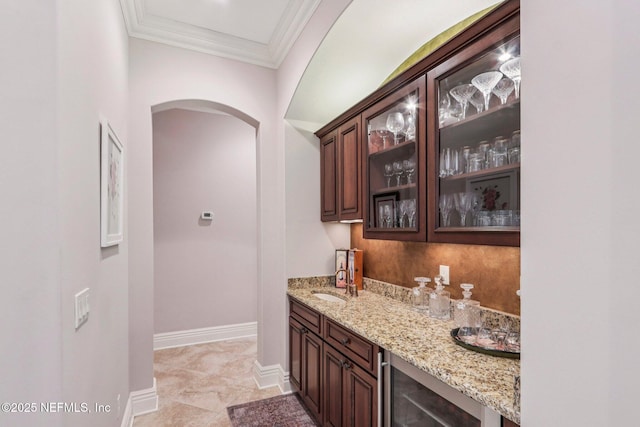 2645 Oakgrove Ave, Saint Augustine, FL 32092 - indoor dry bar with arched walkways and ornamental molding