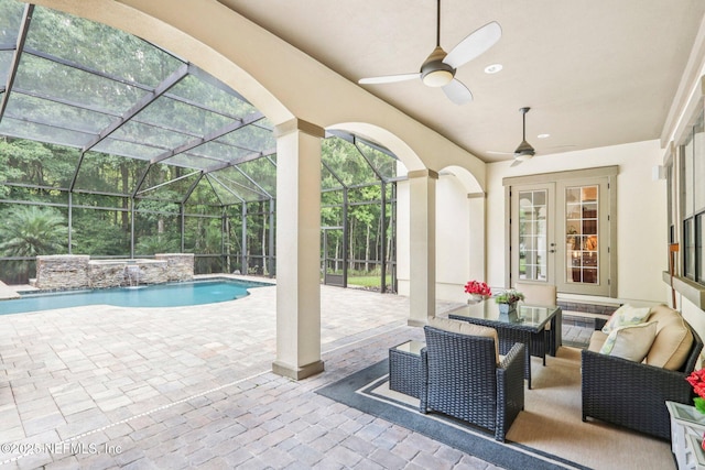 2645 Oakgrove Ave, Saint Augustine, FL 32092 - view of patio featuring a ceiling fan, an outdoor pool, an outdoor hangout area, french doors, and glass enclosure
