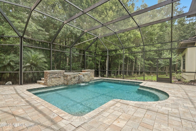 2645 Oakgrove Ave, Saint Augustine, FL 32092 - view of swimming pool with a patio area, a lanai, and a pool with connected hot tub