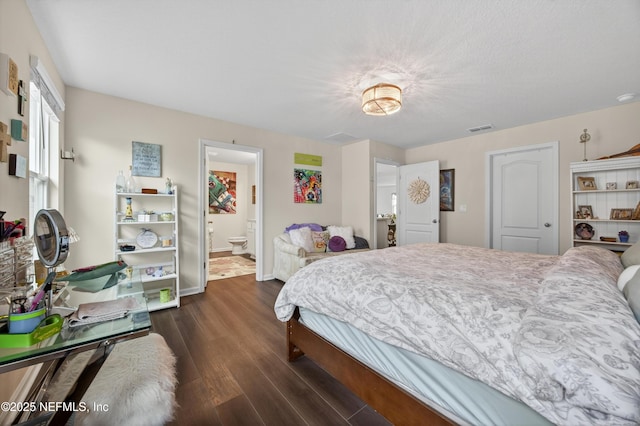 2069 Denton Trce, Green Cove Springs, FL 32043 - bedroom with dark wood-style flooring and ensuite bathroom