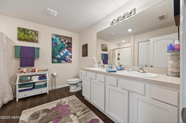 2069 Denton Trce, Green Cove Springs, FL 32043 - full bath featuring double vanity, wood finished floors, and curtained shower