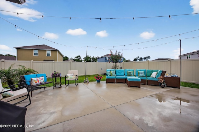 2069 Denton Trce, Green Cove Springs, FL 32043 - fenced backyard with outdoor lounge area and a patio area