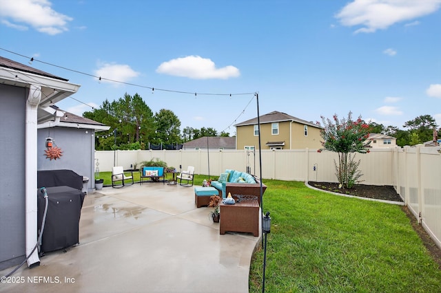 2069 Denton Trce, Green Cove Springs, FL 32043 - fenced backyard with an outdoor hangout area and a patio