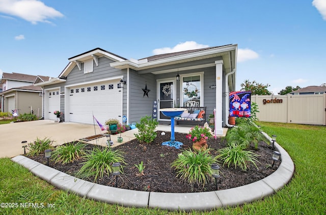 2069 Denton Trce, Green Cove Springs, FL 32043 - view of front facade with an attached garage, driveway, and covered porch
