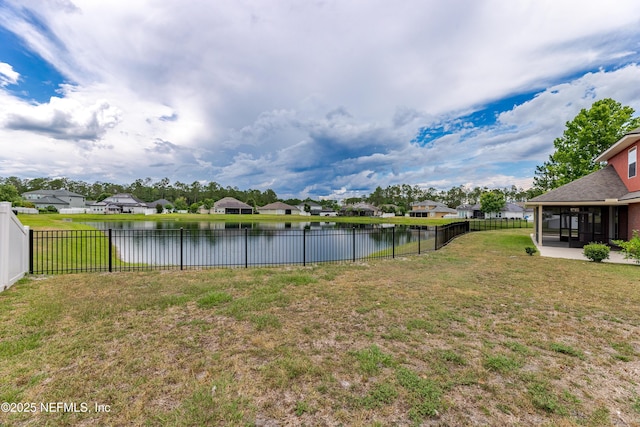 1300 Coopers Hawk Way, Middleburg, FL 32068 - fenced backyard featuring a sunroom, a residential view, and a water view