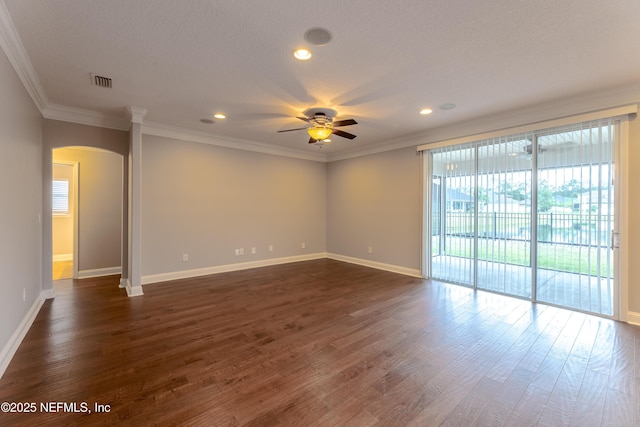 1300 Coopers Hawk Way, Middleburg, FL 32068 - spare room with a ceiling fan, arched walkways, dark wood-style flooring, ornamental molding, and recessed lighting