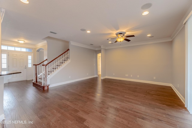 1300 Coopers Hawk Way, Middleburg, FL 32068 - unfurnished living room with dark wood-type flooring, stairs, ceiling fan, crown molding, and recessed lighting