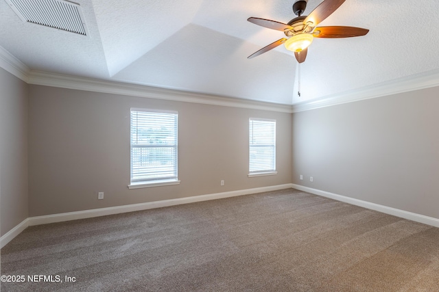 1300 Coopers Hawk Way, Middleburg, FL 32068 - empty room featuring carpet, vaulted ceiling, crown molding, ceiling fan, and a textured ceiling