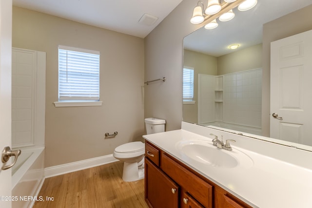 1300 Coopers Hawk Way, Middleburg, FL 32068 - bathroom with vanity, wood finished floors, and  shower combination
