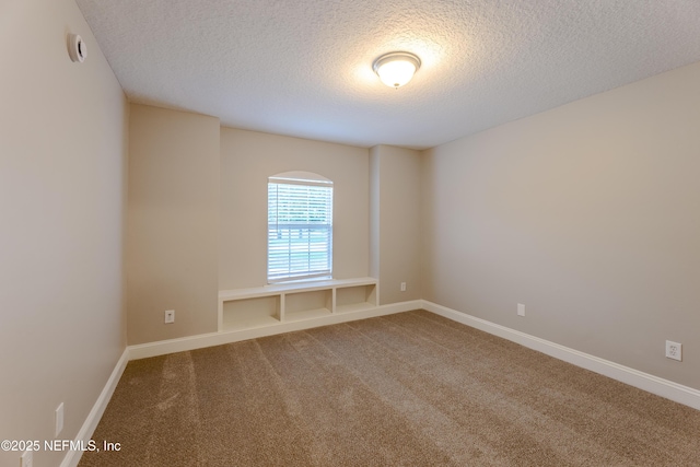 1300 Coopers Hawk Way, Middleburg, FL 32068 - carpeted spare room featuring a textured ceiling and a smoke detector