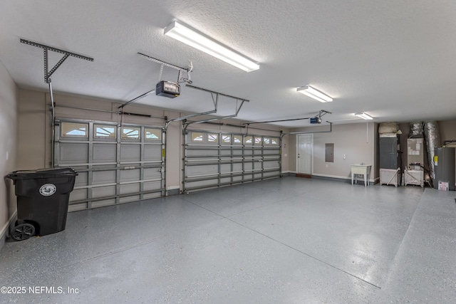1300 Coopers Hawk Way, Middleburg, FL 32068 - garage with water heater, electric panel, a garage door opener, and heating unit