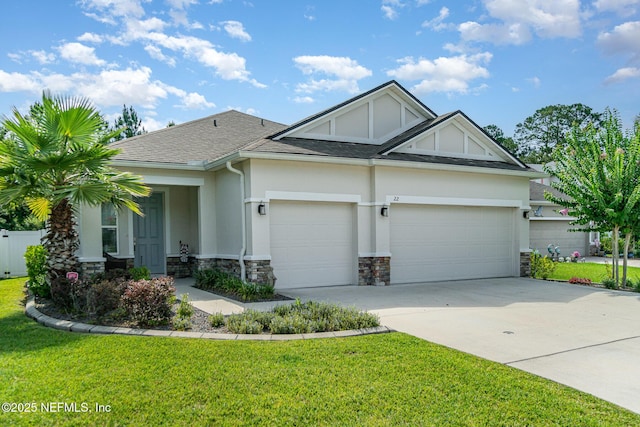 22 Sandstone Dr, Saint Augustine, FL 32086 - craftsman-style home with stone siding, a garage, stucco siding, and concrete driveway