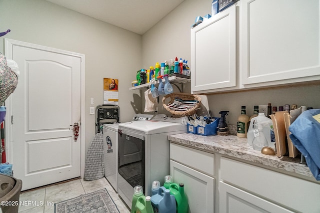 22 Sandstone Dr, Saint Augustine, FL 32086 - laundry room with independent washer and dryer, cabinet space, and light tile patterned floors