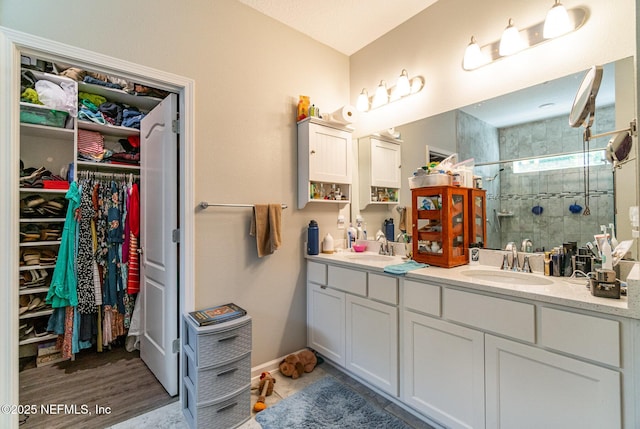 22 Sandstone Dr, Saint Augustine, FL 32086 - full bath featuring double vanity, a stall shower, and a spacious closet