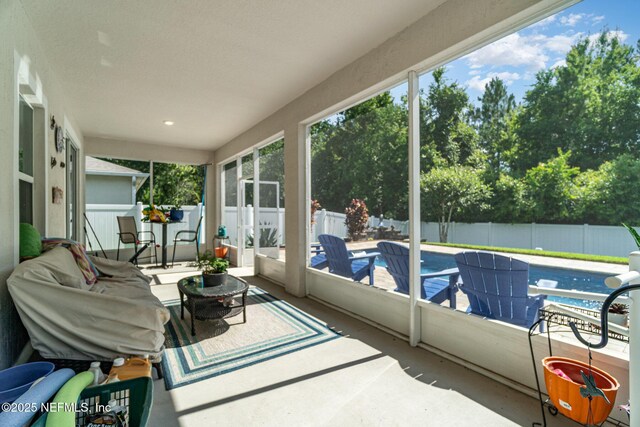 22 Sandstone Dr, Saint Augustine, FL 32086 - sunroom / solarium featuring view of scattered trees