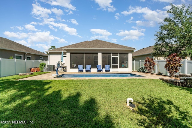 22 Sandstone Dr, Saint Augustine, FL 32086 - rear view of property featuring a sunroom, a fenced backyard, stucco siding, and a patio area