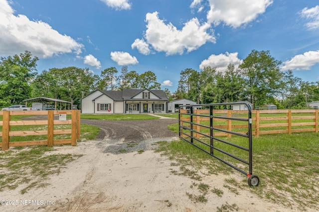 1926 Friendly Pl, Middleburg, FL 32068 - view of front of home with a gate, a carport, and curved driveway
