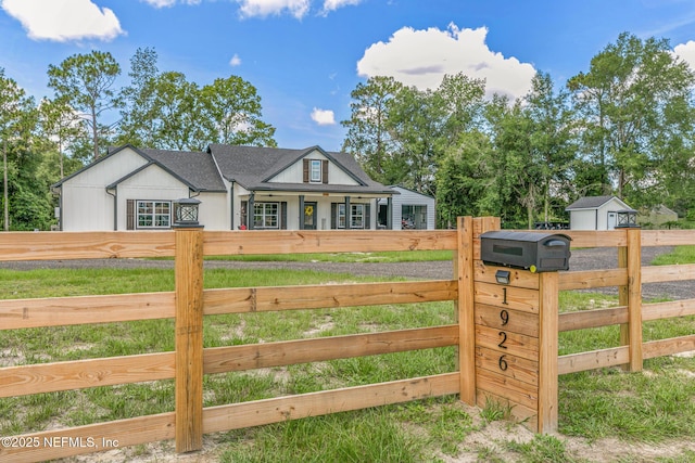 1926 Friendly Pl, Middleburg, FL 32068 - modern farmhouse style home featuring a fenced front yard and a gate