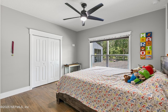 1926 Friendly Pl, Middleburg, FL 32068 - bedroom featuring wood finished floors, a closet, and ceiling fan