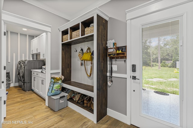 1926 Friendly Pl, Middleburg, FL 32068 - mudroom featuring washing machine and clothes dryer and light wood-style floors
