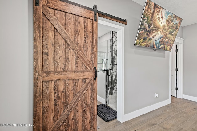1926 Friendly Pl, Middleburg, FL 32068 - foyer entrance with a barn door and wood finished floors