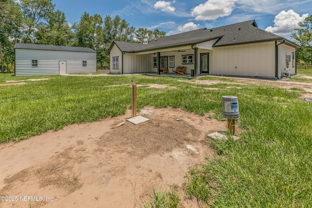 1926 Friendly Pl, Middleburg, FL 32068 - rear view of house with a yard, a patio, ceiling fan, and roof with shingles