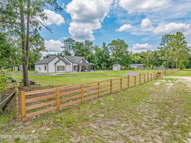 1926 Friendly Pl, Middleburg, FL 32068 - fenced yard featuring a shed and dirt driveway