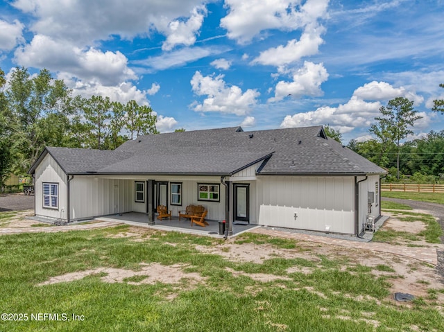 1926 Friendly Pl, Middleburg, FL 32068 - back of property with a patio and a shingled roof