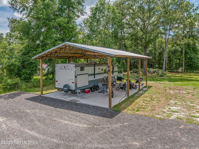 1926 Friendly Pl, Middleburg, FL 32068 - view of vehicle parking with a detached carport