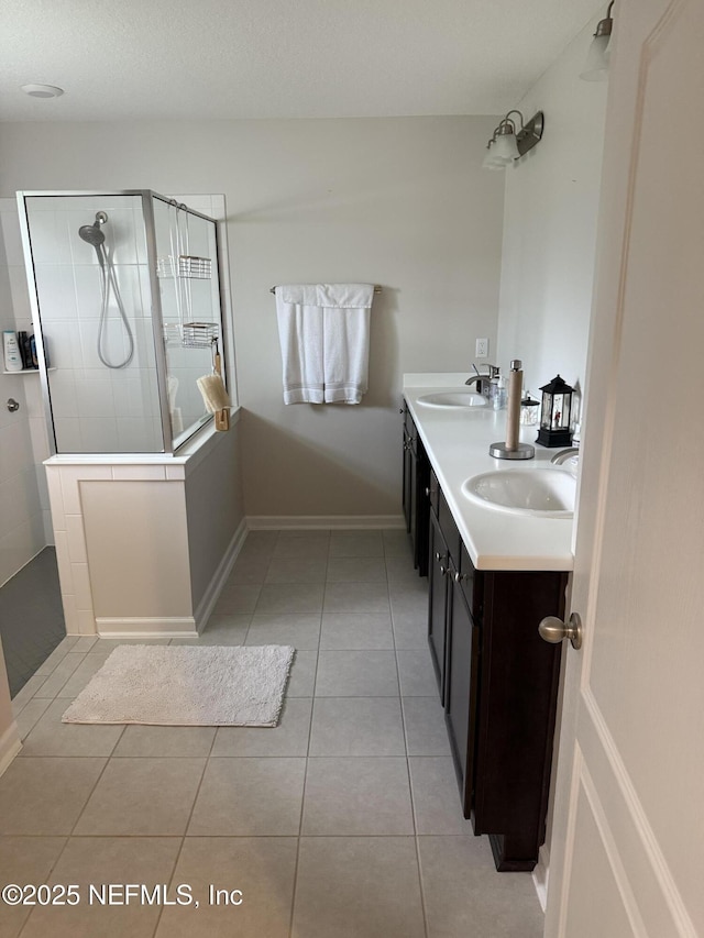 30139 Trophy Trl, Bryceville, FL 32009 - full bathroom featuring tiled shower, tile patterned flooring, and double vanity