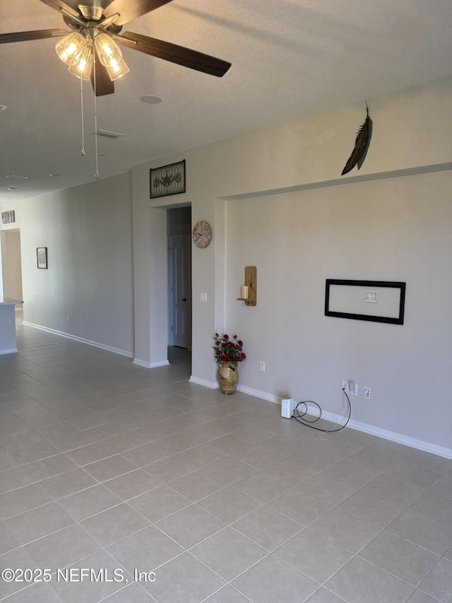 30139 Trophy Trl, Bryceville, FL 32009 - spare room featuring ceiling fan and light tile patterned flooring