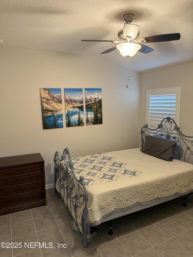 30139 Trophy Trl, Bryceville, FL 32009 - tiled bedroom featuring a textured ceiling and ceiling fan