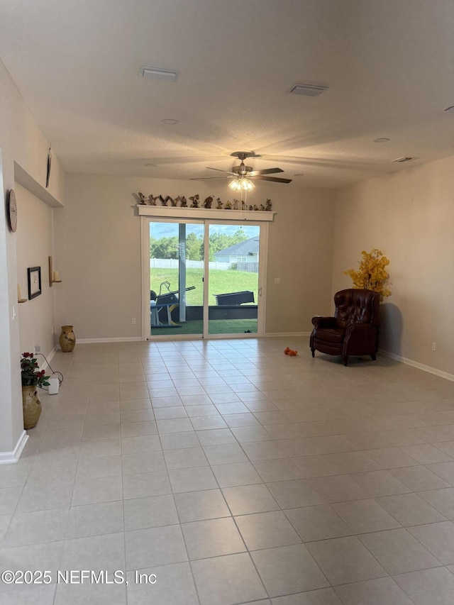 30139 Trophy Trl, Bryceville, FL 32009 - spare room featuring ceiling fan and light tile patterned flooring