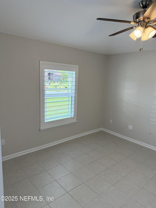 30139 Trophy Trl, Bryceville, FL 32009 - empty room featuring a ceiling fan and baseboards