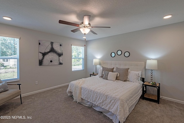 3138 Phyllis St, Jacksonville, FL 32205 - carpeted bedroom featuring baseboards and a ceiling fan