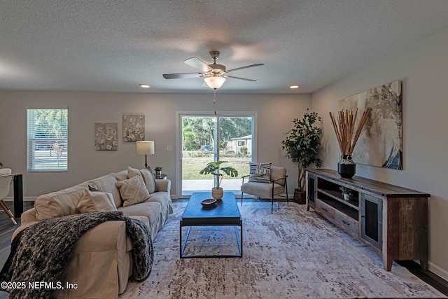 3138 Phyllis St, Jacksonville, FL 32205 - living area featuring a ceiling fan, a textured ceiling, wood finished floors, and recessed lighting