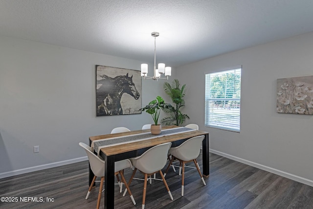 3138 Phyllis St, Jacksonville, FL 32205 - dining space with a chandelier and dark wood-style floors