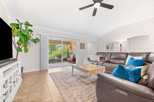338 Deerfield Glen Dr, Saint Augustine, FL 32086 - living room with crown molding, ceiling fan, lofted ceiling, light tile patterned floors, and arched walkways