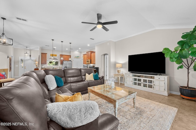 338 Deerfield Glen Dr, Saint Augustine, FL 32086 - living area with a ceiling fan, ornamental molding, vaulted ceiling, and light tile patterned flooring